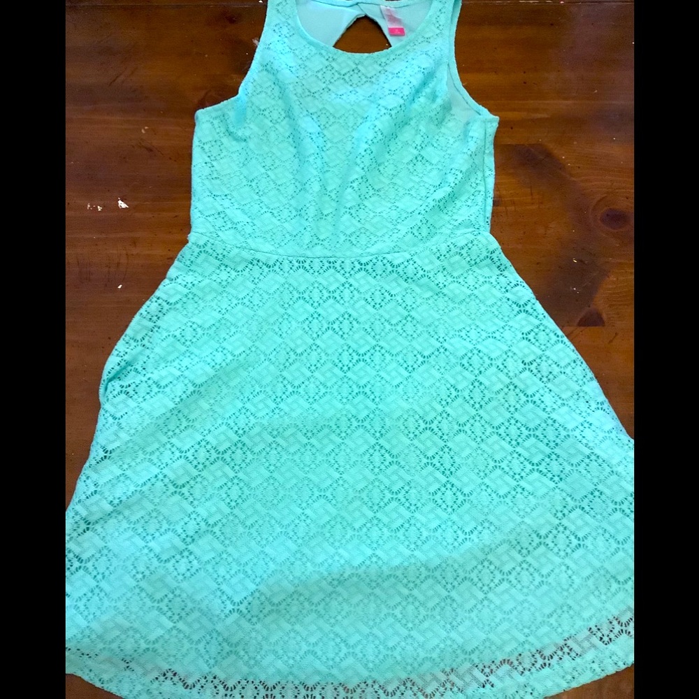 Teal kids dress. With an open back.. been worn a few times
